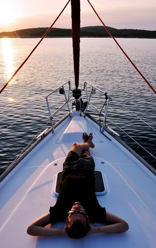 Man relaxing on ship